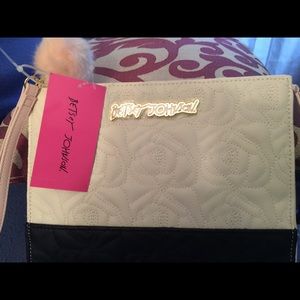Betsey Johnson large cosmetic bag.